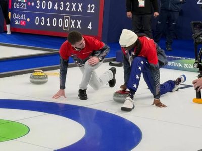 snoop-dogg-makes-surprise-appearance-at-usa-canada-olympic-curling-match.Click to read full article.
